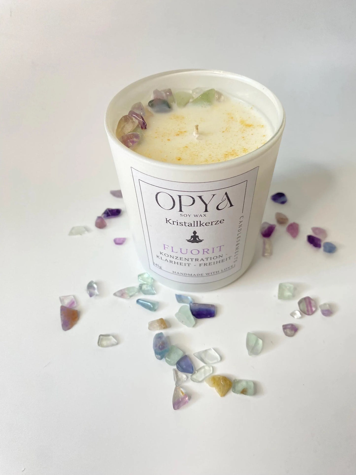 Kristall-Duft-Kerze mit Regenbogenfluorit-Kristallen