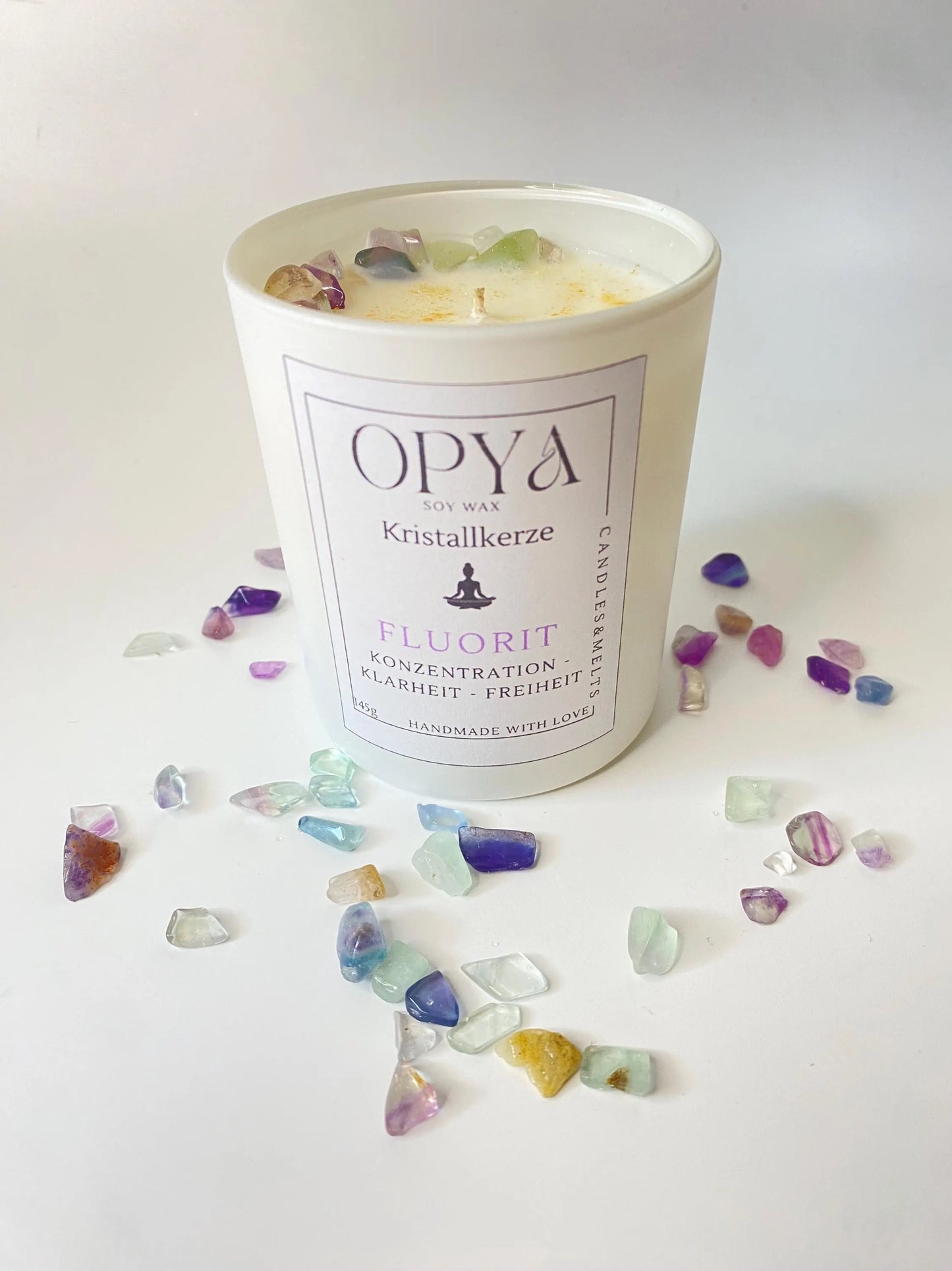 Kristall-Duft-Kerze mit Regenbogenfluorit-Kristallen